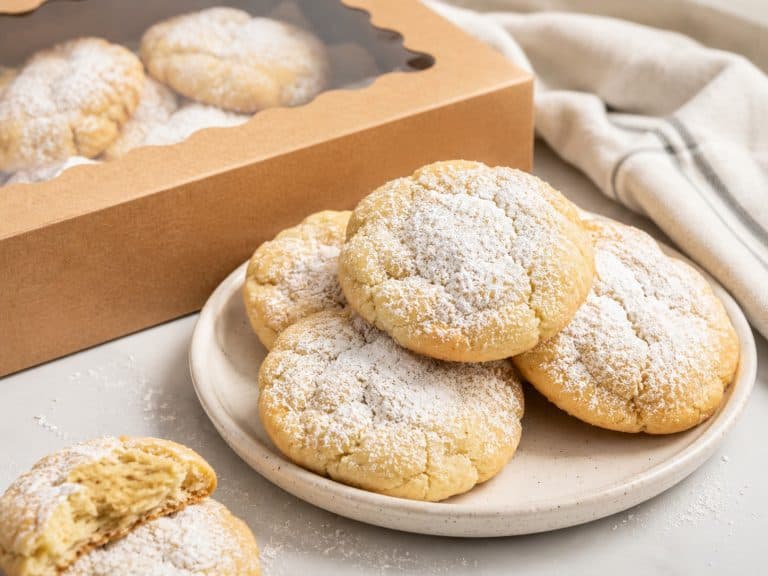 Freshly baked cookies dusted with powdered sugar from Smutz Girls Bakery.