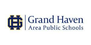 Grand Haven Area Public Schools logo with navy and gold design.
