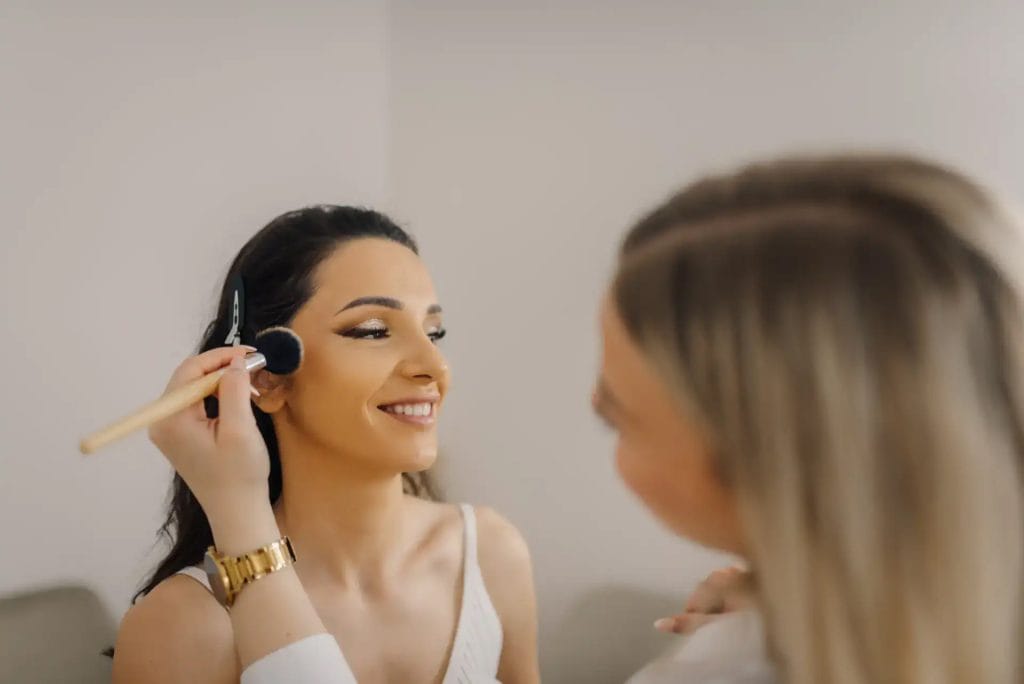 Bridal makeup application at Beauty Bar & Spa with professional artist.