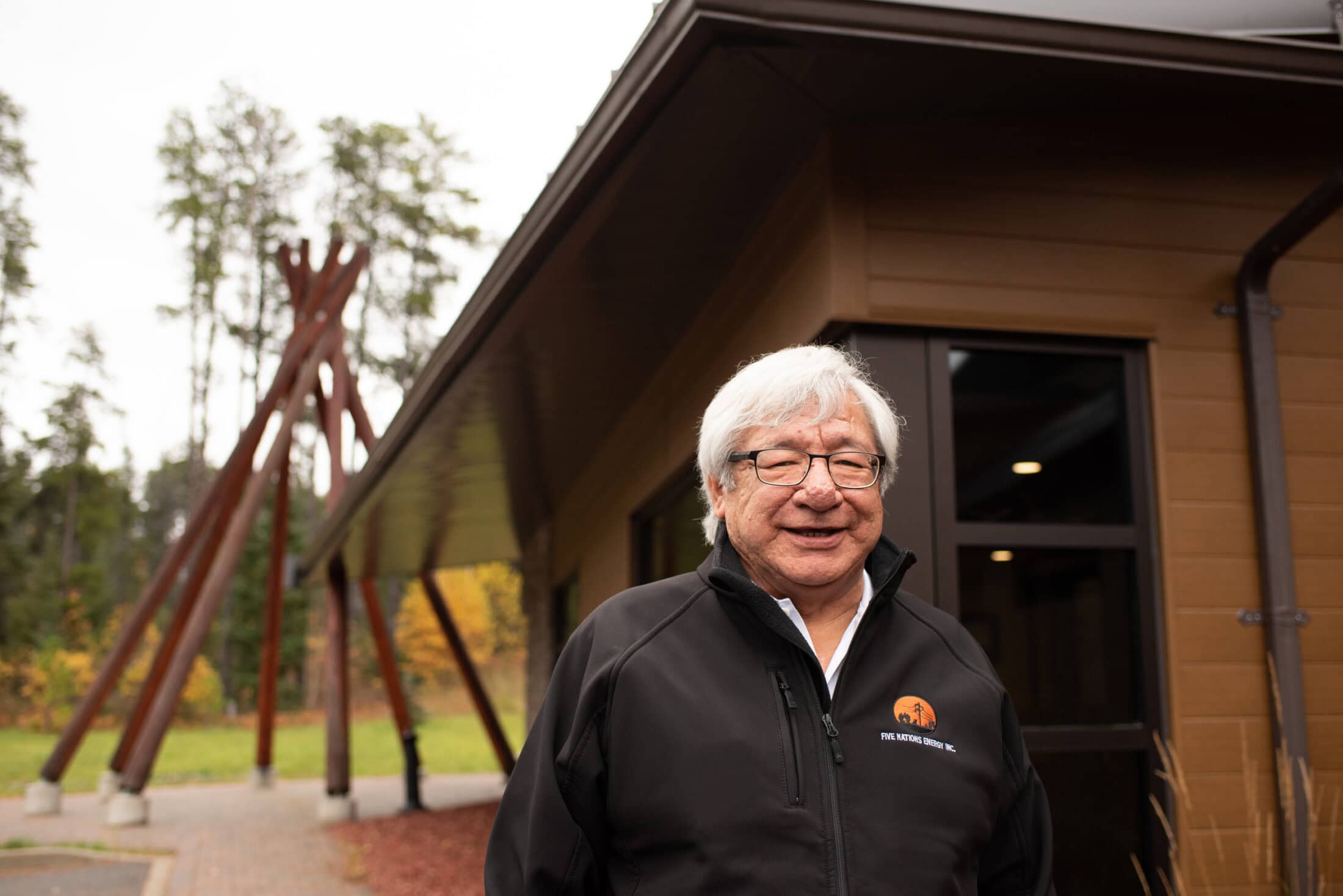 Pat outside head office of Five Nations Energy 725 Hwy 655 Timmi