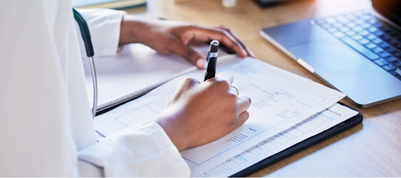 medical review officer taking notes
