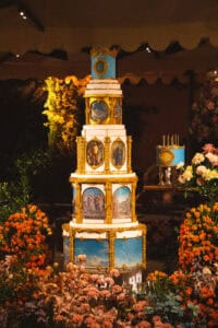 Two-metre celebration birthday cake with 28 hand-painted fresco panels, molded Renaissance details, and 24k gold at the Four Seasons Florence, Italy.