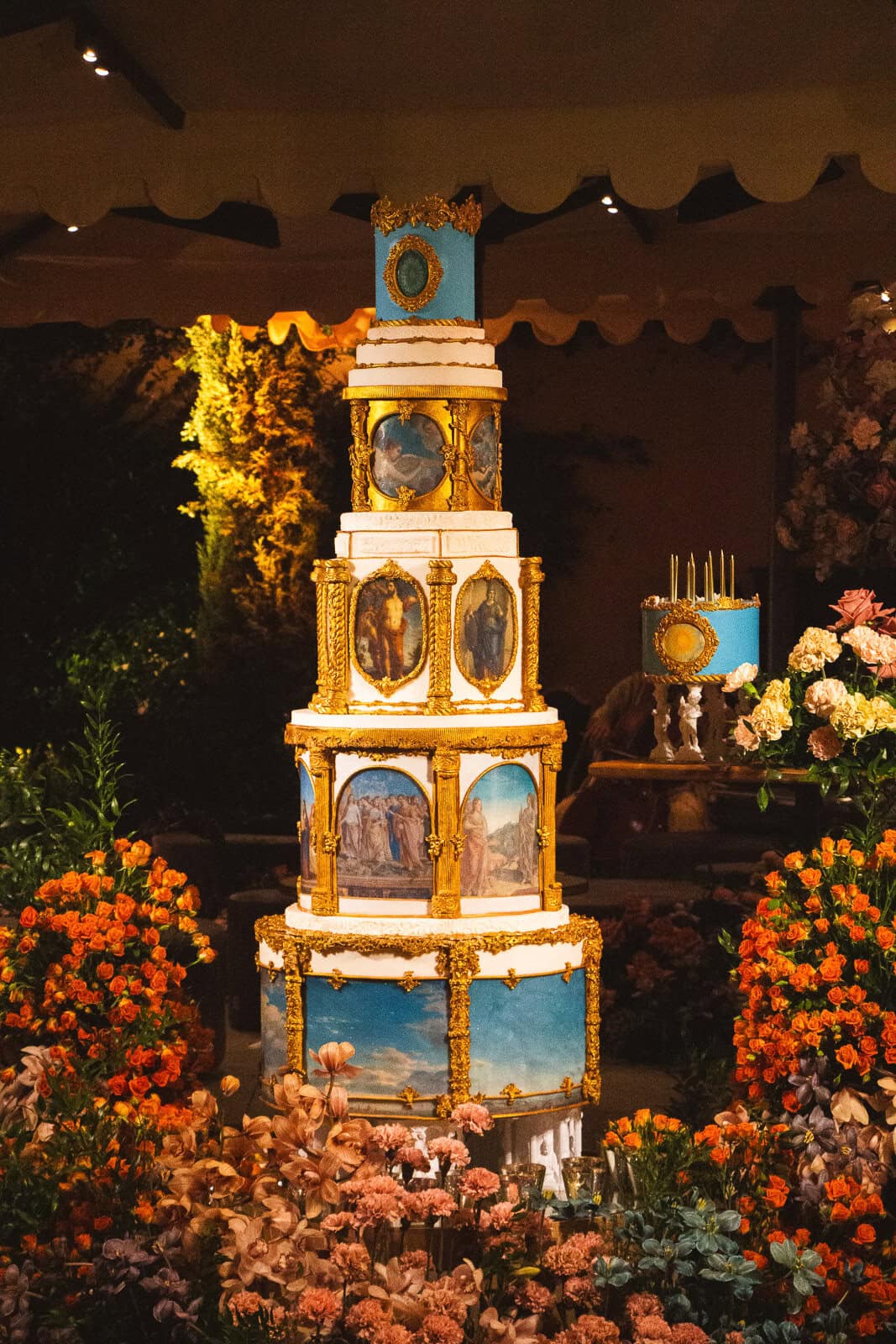 Two-metre celebration birthday cake with 28 fresco panels, molded Renaissance details, and 24k gold at the Four Seasons Florence, Italy.