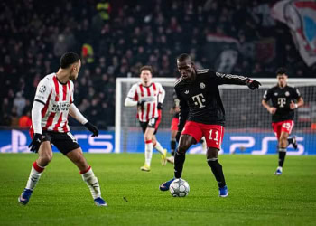EINDHOVEN, NETHERLANDS - JANUARY 28: Nicolas Jackson of FC Bayern Muenchen is being challenged during the UEFA Champions League 2025/26 League Phase MD8 match between PSV Eindhoven and FC Bayern München at PSV Stadion on January 28, 2026 in Eindhoven, Netherlands. (Photo by S. Mellar/FC Bayern via Getty Images)