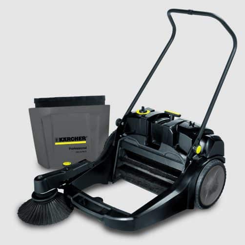 Power cleaning equipment with a large brush and detergent container for efficient cleaning.
