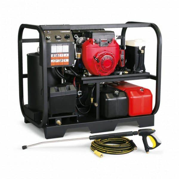 Portable pressure washer with engine, tank, and spray gun for industrial cleaning.