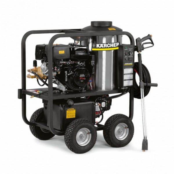 Karcher pressure washer on a mobile cart with hose and spray gun.