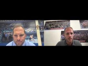 Two coaches in a video call discussing pre-season training strategies.
