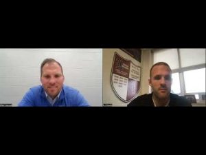 Two wrestling experts in a virtual interview for Wrestling Vault.