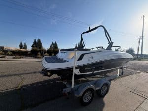 Bayliner VR5 boat on trailer ready for water use.