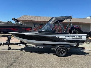 Crestliner Fish Hawk boat with Mercury 115HP outboard on trailer.