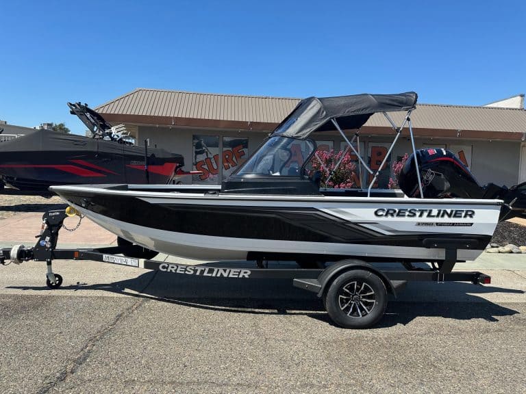 Crestliner Fish Hawk boat with Mercury 115HP outboard on trailer.