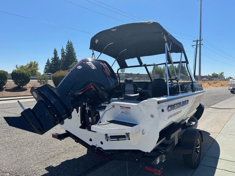 White Crestliner Fish Hawk boat with Mercury 115HP outboard engine.