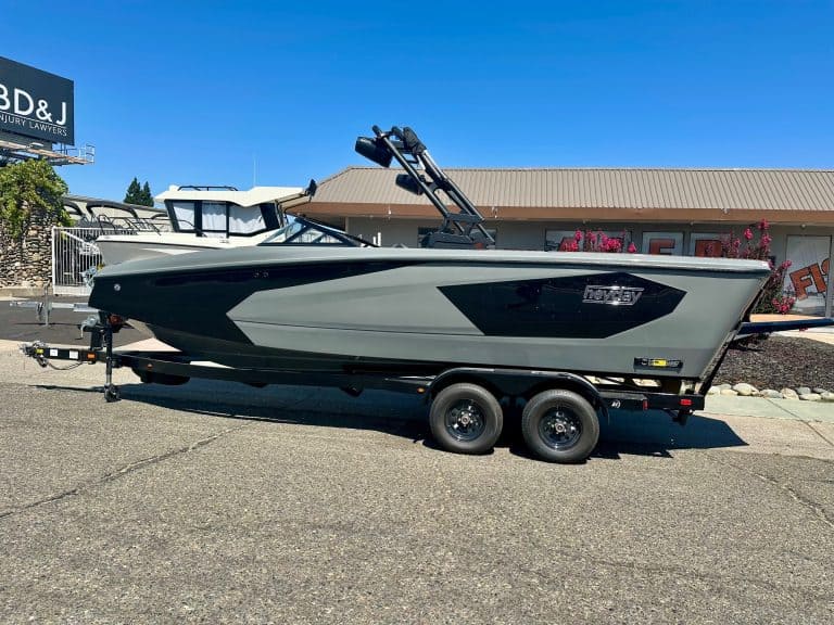 High-performance 2025 Heyday WT Surf boat on trailer for sale.