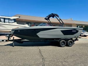 High-performance 2025 Heyday WT Surf boat on trailer for water sports.