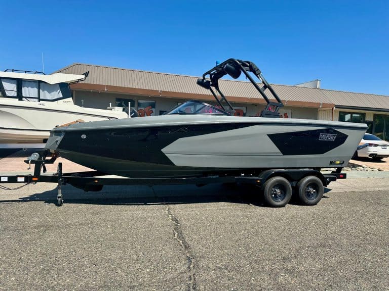 High-performance 2025 Heyday WT Surf boat on trailer for water sports.
