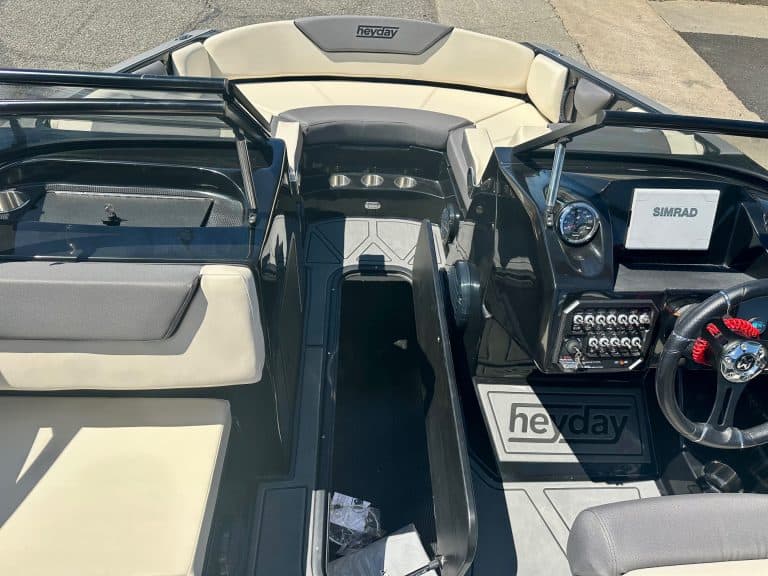 Interior view of the Heyday WT2 DC boat with steering and seating.
