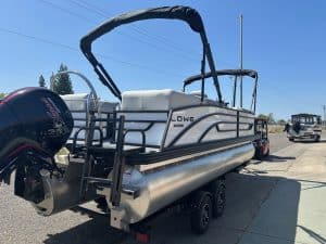 Pontoon boat featuring Lowe 2025 SS model with Mercury 150HP Pro Xs engine.
