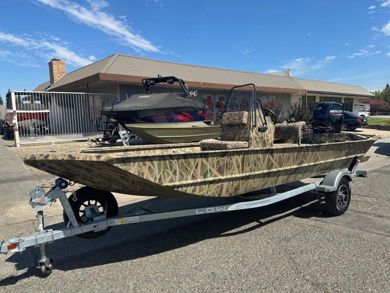 Boat with Mercury 80HP jet engine on trailer.