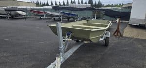Boat trailer for Klamath 10 JAC model in outdoor storage.