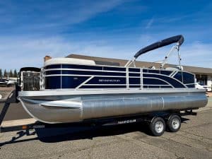 Bennington 22SSB pontoon boat on trailer, ready for water.
