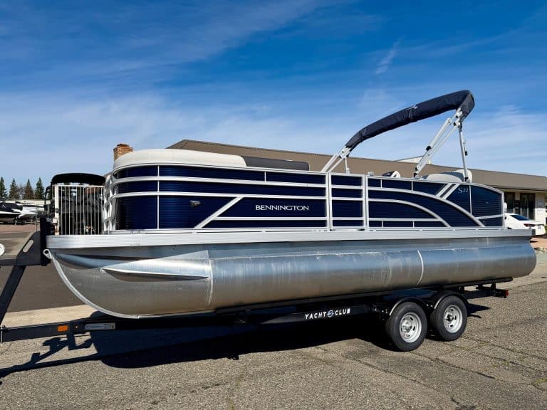 Bennington 22SSB pontoon boat on trailer, ready for water.