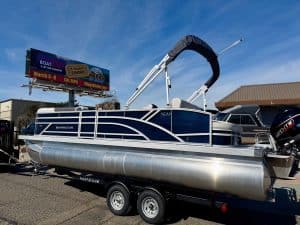 Bennington 22SSB pontoon boat with sleek design and powerful outboard engine. Perfect for family out.