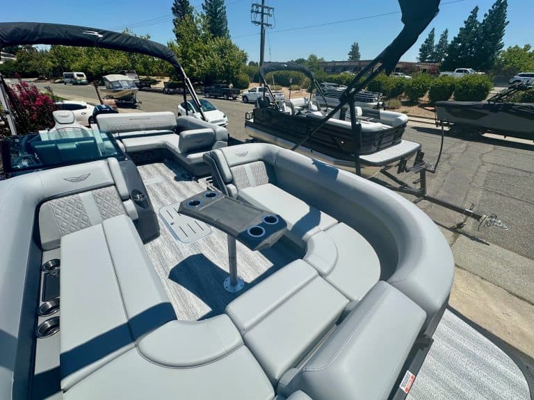 Luxury pontoon boat with spacious seating and modern design. Perfect for leisure and water adventure.
