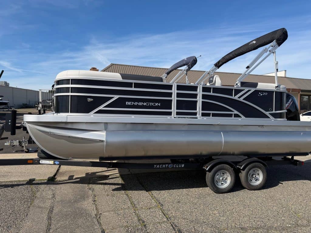 Bennington 20SSR pontoon boat on trailer, ideal for family boating and water fun.