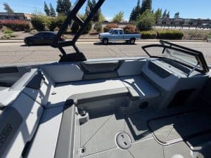 Interior view of the 2026 Heyday WT2 DC surf boat with seating and steering area.