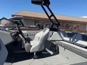 Interior view of the 2026 Heyday WT2 DC surf boat with seating and steering console.