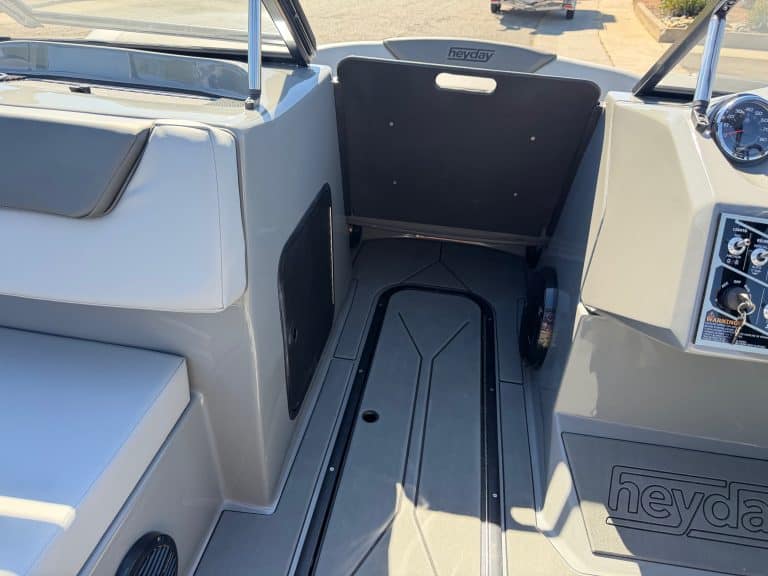 Interior view of the 2026 Heyday WT2 DC surf boat showing seating and steering area.