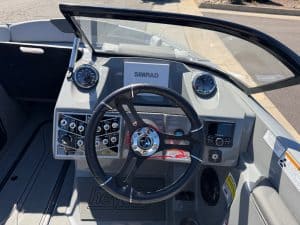 Boat dashboard with steering wheel and navigation instruments for 2026 Heyday WT2 DC.