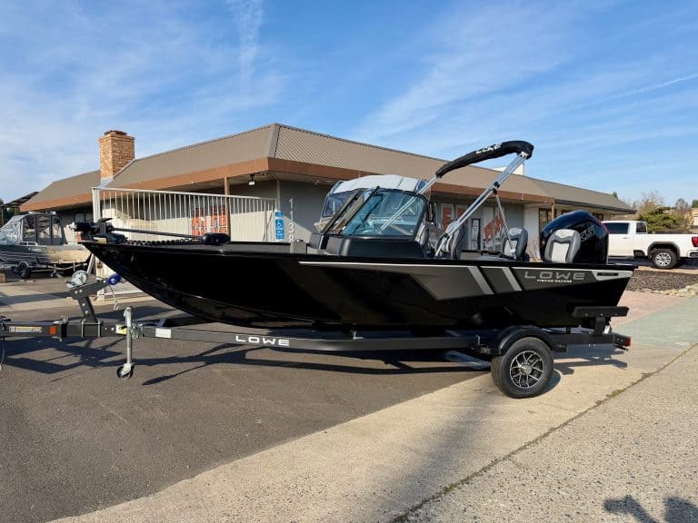 Lowe FM 1775 WT boat with Mercury 115HP Pro XS engine on trailer.
