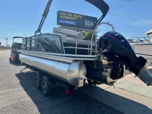 Lowe pontoon boat equipped with Mercury 150HP Pro Xs outboard motor.