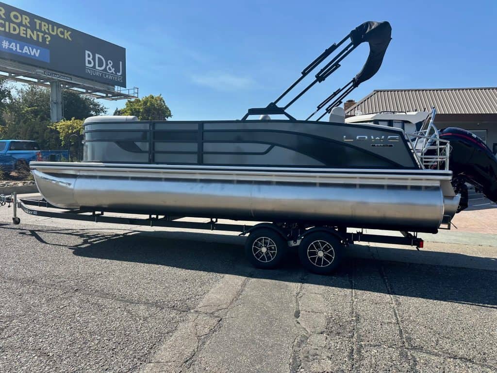 Lowe SS 230 CL pontoon boat featuring Mercury 150HP Pro Xs engine, ideal for leisure and water sport.