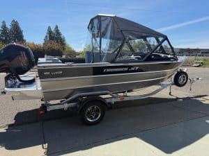 Boat with Mercury 150HP engine, Thunder Jet Luxor 185 model, ideal for water adventures.