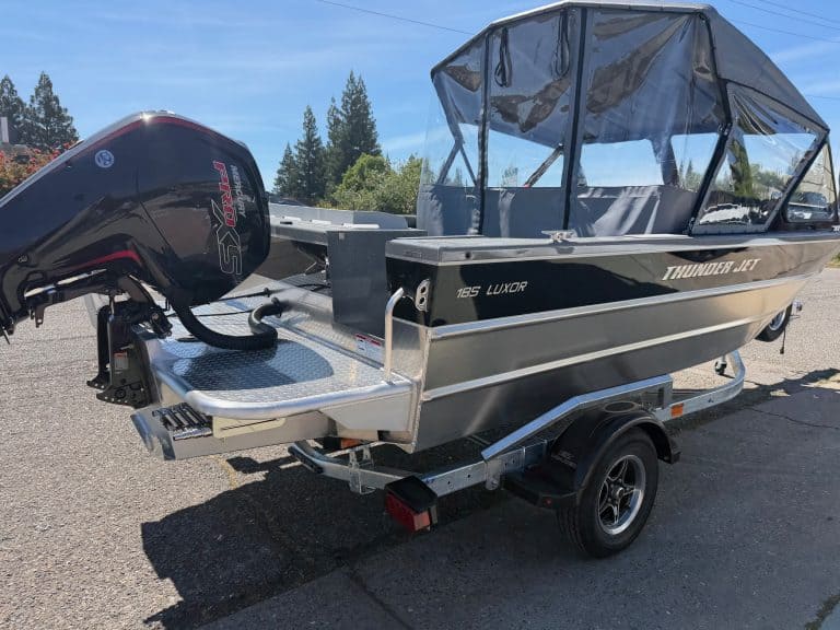 Boat with Mercury 150HP engine for sale.