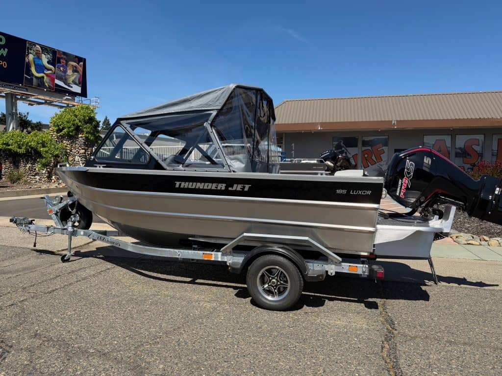 Thunder Jet Luxor 185 boat with Mercury 150HP engine on trailer.