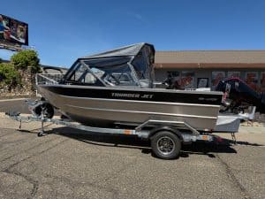 Thunder Jet Luxor 185 boat with Mercury 150HP engine on trailer.