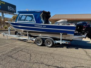 Boat on trailer for sale, Thunder Jet 24FT Alexis Pro model with powerful outboard motor.