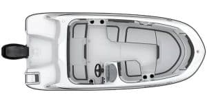 Boat interior with seating and steering wheel for the Bayliner M15 model.
