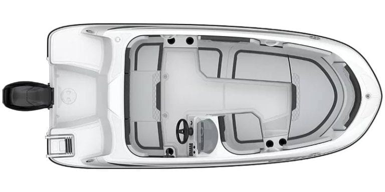 Boat interior with seating and steering wheel for the Bayliner M15 model.