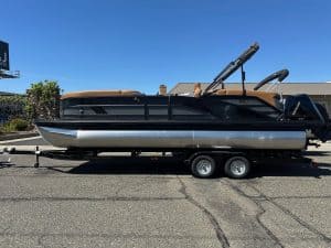 Bennington M 24 pontoon boat featuring a Mercury 200HP outboard motor, ideal for family outings and.