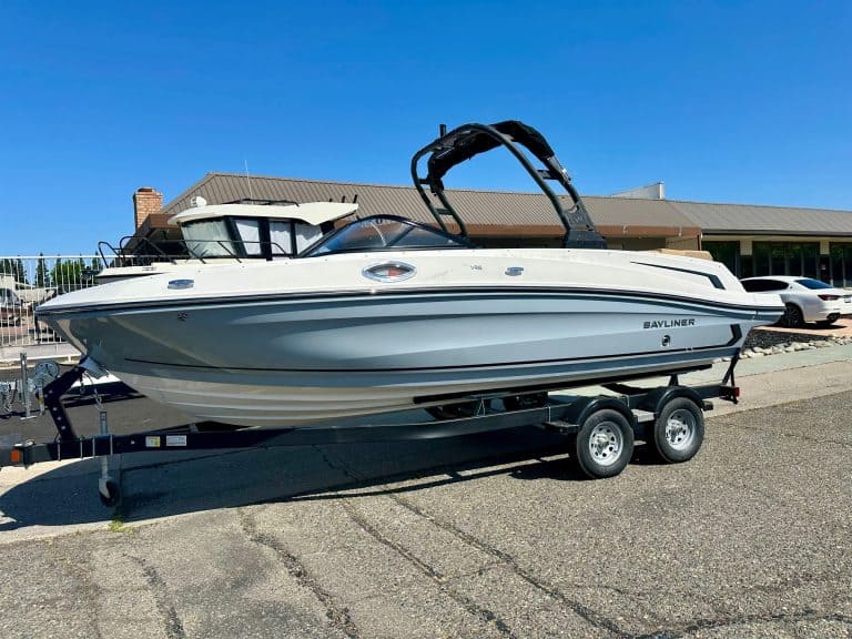 Boat on trailer at dealership for 2025 Bayliner VR6.