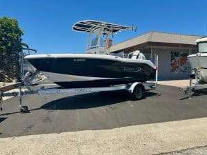 Robalo R180 fishing boat on trailer, ideal for coastal and freshwater adventures.