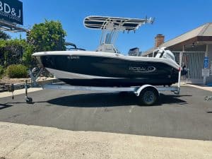 Robalo R180 fishing boat on trailer, ready for water adventures.