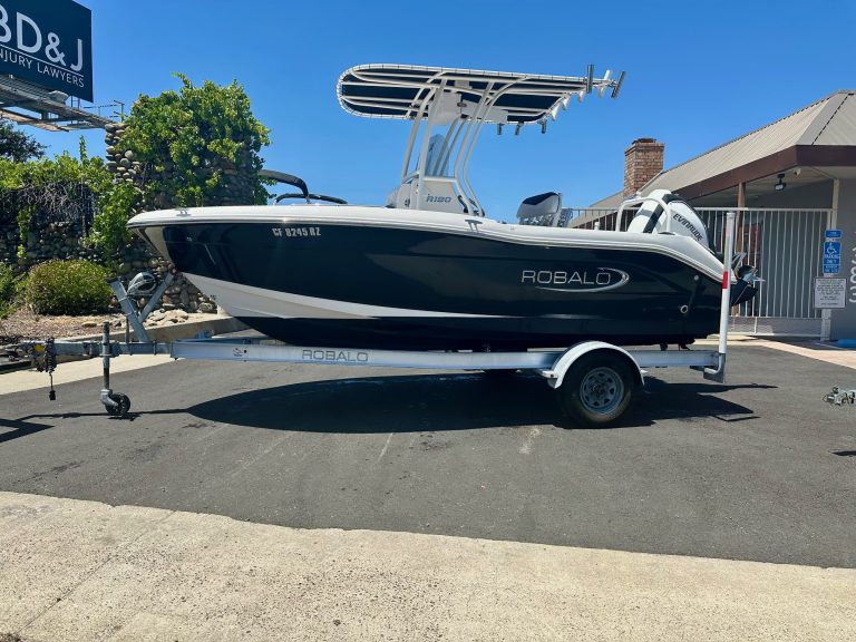Robalo R180 fishing boat on trailer, ready for water adventures.