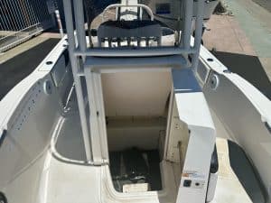White Robalo R 180 boat with center console and seating.