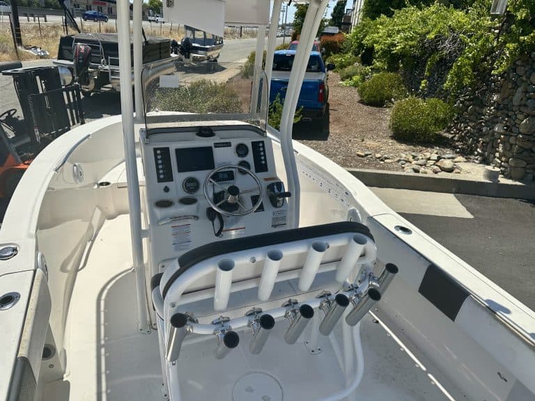 Close-up of the dashboard and steering wheel of a 2019 Robalo boat.